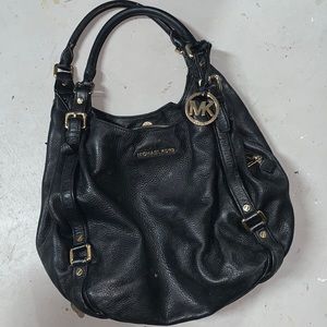 Black purse by Michael Kors